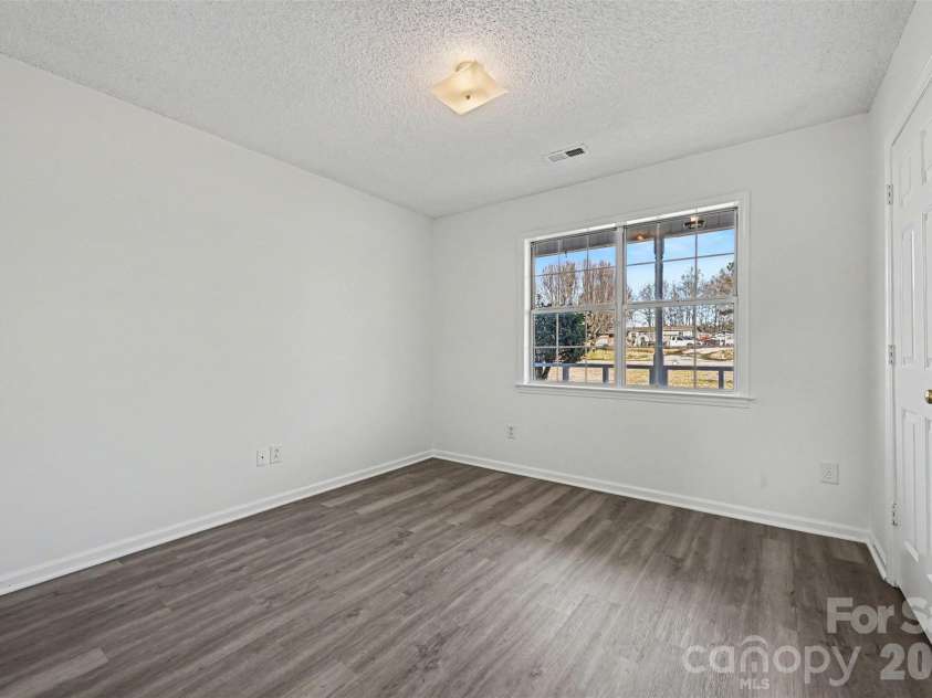 5009 Hampton Meadows Road, Monroe, NC 28110.  MLS# CAR4343192, YatesRealty ID 10271. Bedroom 2