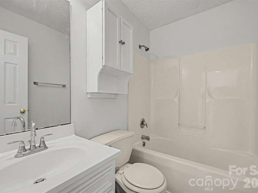 5009 Hampton Meadows Road, Monroe, NC 28110.  MLS# CAR4343192, YatesRealty ID 10271. Common bathroom