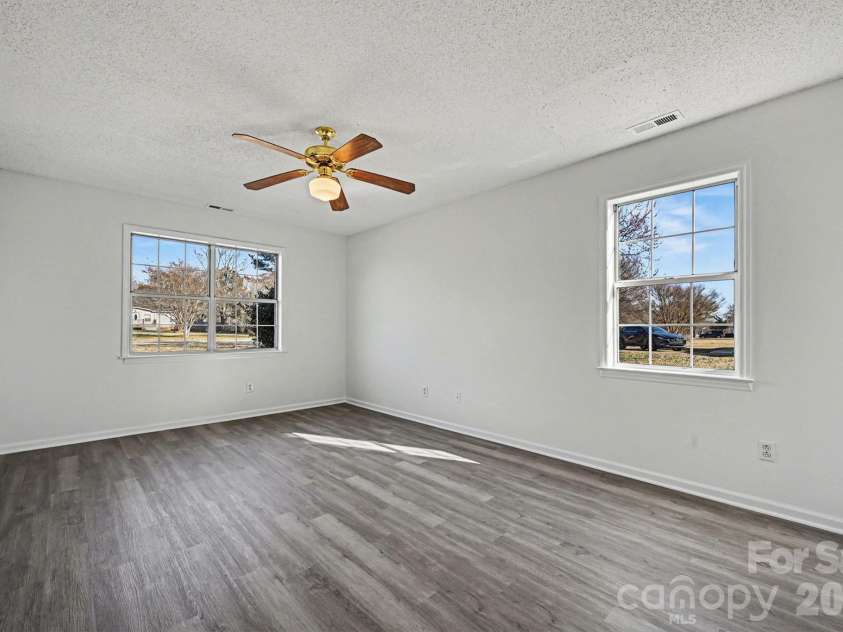 5009 Hampton Meadows Road, Monroe, NC 28110.  MLS# CAR4343192, YatesRealty ID 10271. Primary bedroom