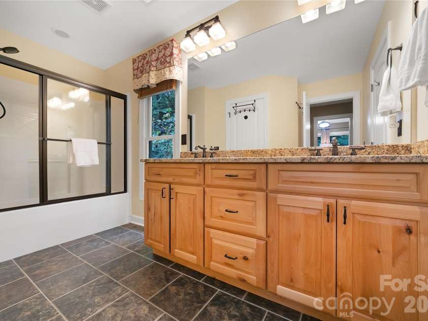 923 Ugugu Drive, Brevard, NC 28712.  MLS# CAR4307583, YatesRealty ID 10273. 
