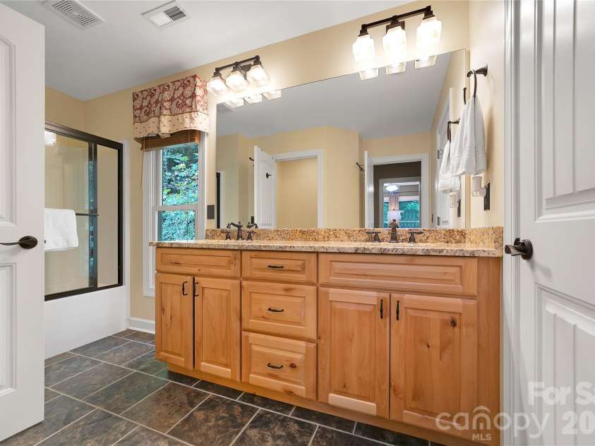923 Ugugu Drive, Brevard, NC 28712.  MLS# CAR4307583, YatesRealty ID 10273. Upper level bathroom
