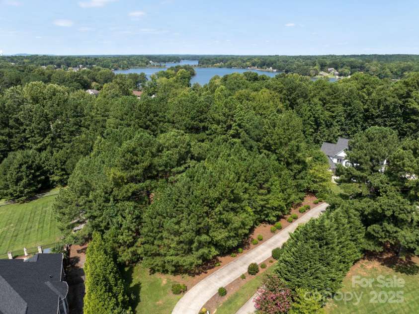 127 Palos Verde Road, Mooresville, NC 28117.  MLS# CAR4153547, YatesRealty ID 10274. Mature trees on the homesite