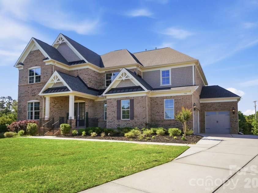 1105 Giacomo Drive, Waxhaw, NC 28173.  MLS# CAR4346410, YatesRealty ID 10275. Over 7,100 square feet of possibility in one of Marvin's most sought-after gated communities.