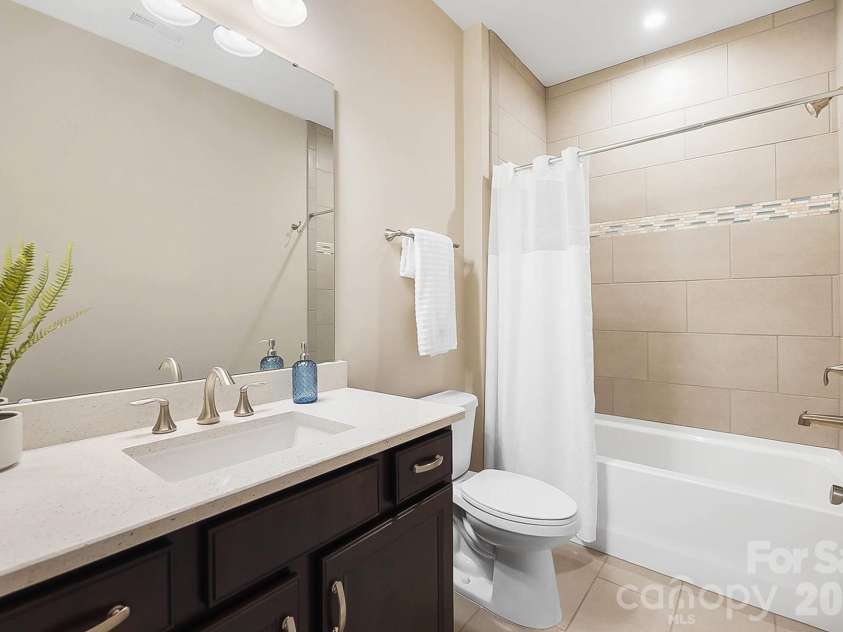 1105 Giacomo Drive, Waxhaw, NC 28173.  MLS# CAR4346410, YatesRealty ID 10275. Secondary Bedroom Ensuite - 1 of 3 on this level.