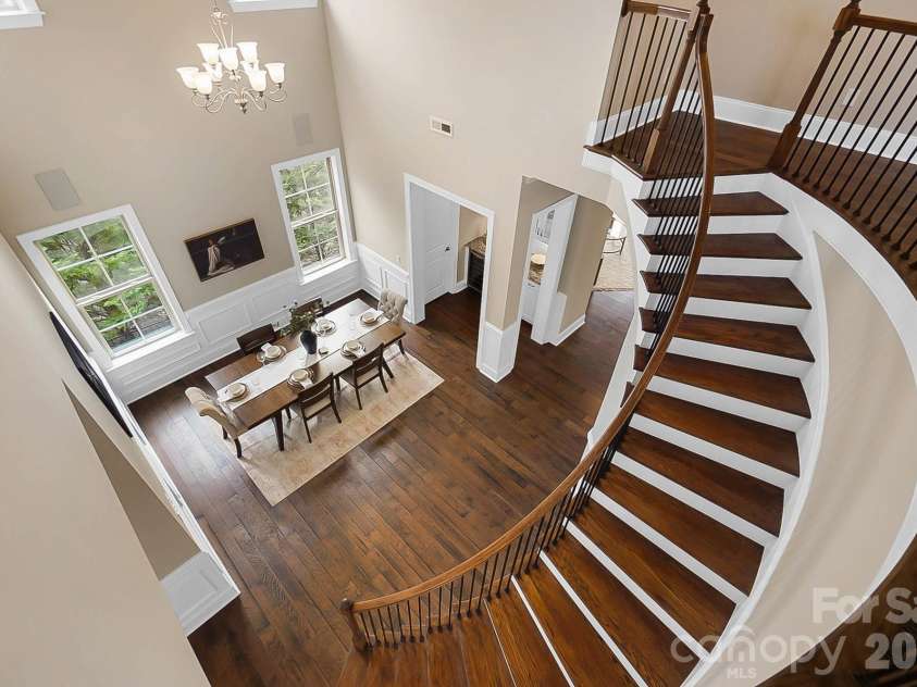 1105 Giacomo Drive, Waxhaw, NC 28173.  MLS# CAR4346410, YatesRealty ID 10275. Sweeping staircase & dramatic two-story dining room making every dinner party memorable.