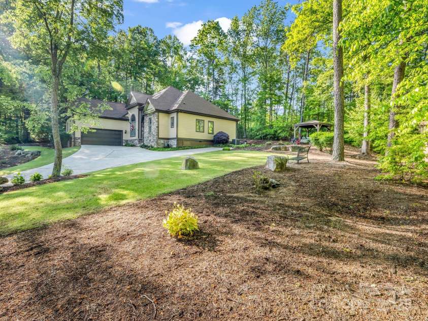 39 Rambling Creek, Tryon, NC 28782.  MLS# CAR4233554, YatesRealty ID 10275. From Street