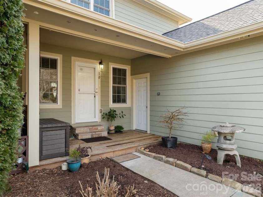 10 Aberdeen Drive, Arden, NC 28704.  MLS# CAR4344820, YatesRealty ID 10276. Covered area from the garage to the front door