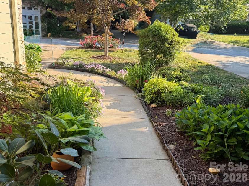 10 Aberdeen Drive, Arden, NC 28704.  MLS# CAR4344820, YatesRealty ID 10276. Nature's beauty surrounds you each time you step out of the door