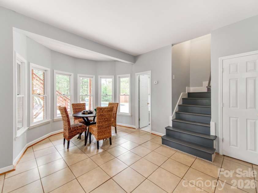 7015 Oakview Lane, Charlotte, NC 28226.  MLS# CAR4365862, YatesRealty ID 10283. Additional Dining Space for The Kiddos with Wet Feat! 