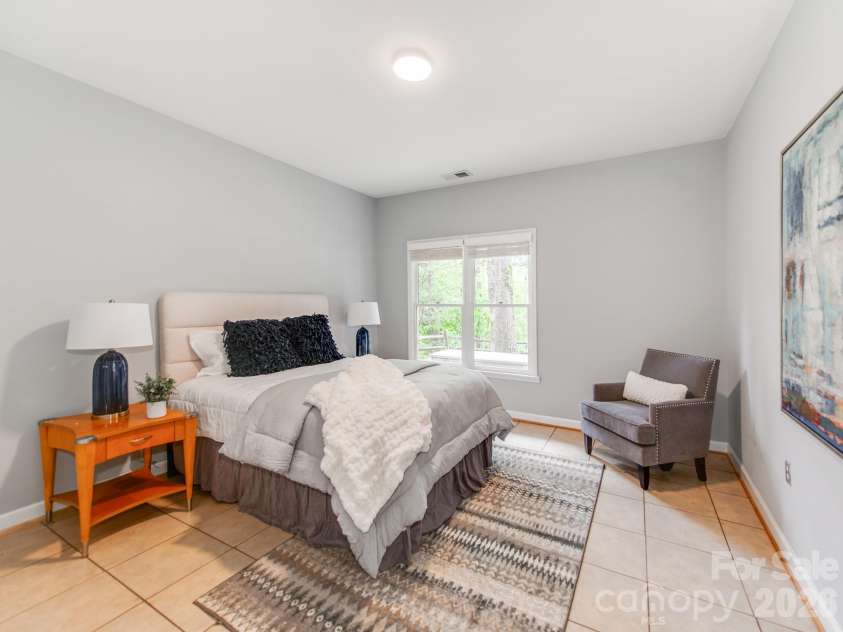 7015 Oakview Lane, Charlotte, NC 28226.  MLS# CAR4365862, YatesRealty ID 10283. Guest Bedroom Lower Level 