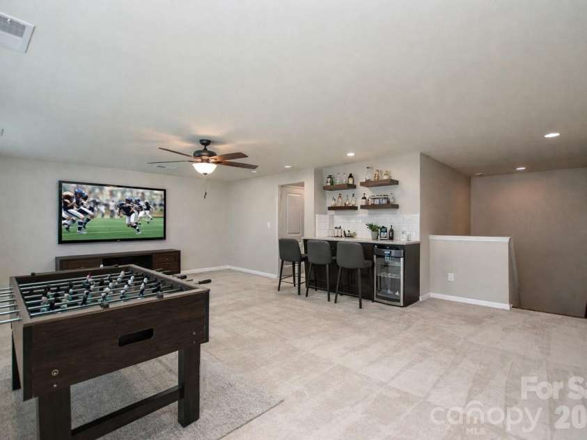 515 Cherry Blossom Avenue, Concord, NC 28027.  MLS# CAR4352090, YatesRealty ID 10288. 2nd Fl. Loft Space Game Room(virtually staged)