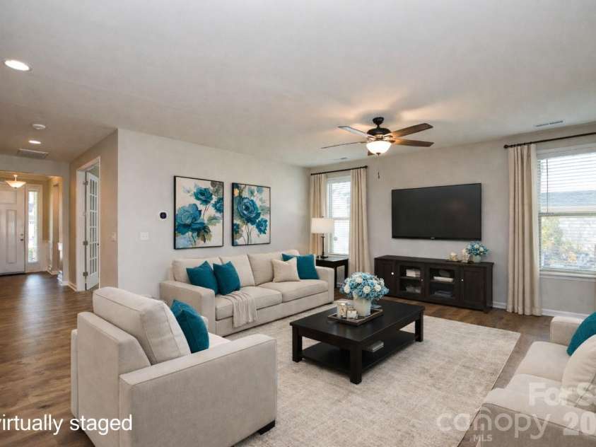 515 Cherry Blossom Avenue, Concord, NC 28027.  MLS# CAR4352090, YatesRealty ID 10288. Family Room (virtually staged)