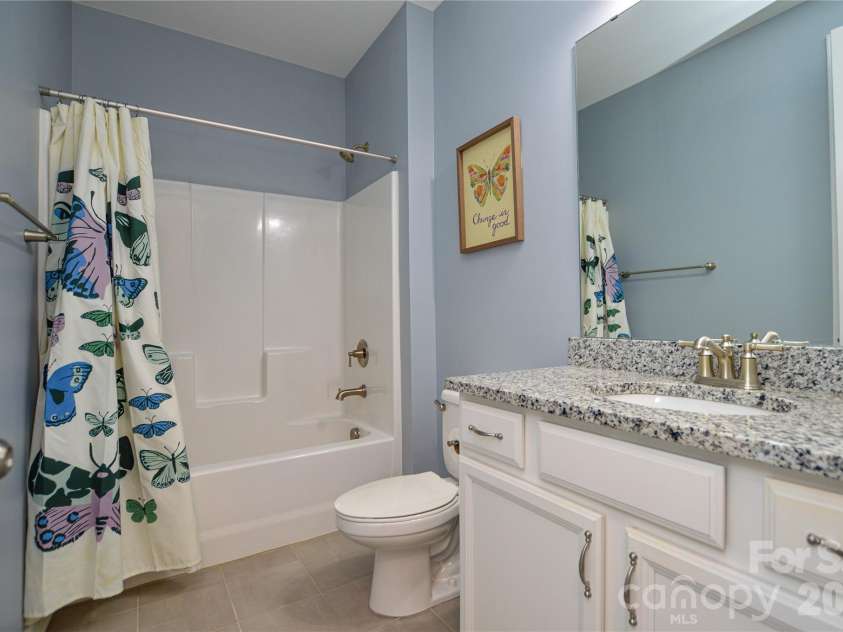 515 Cherry Blossom Avenue, Concord, NC 28027.  MLS# CAR4352090, YatesRealty ID 10288. Main Level Full Bathroom