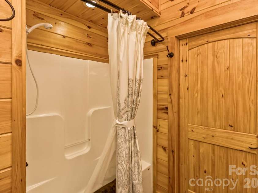 109 Overlook Point Lane, Lake Lure, NC 28746.  MLS# CAR4336925, YatesRealty ID 1029. Ensuite bathroom#3