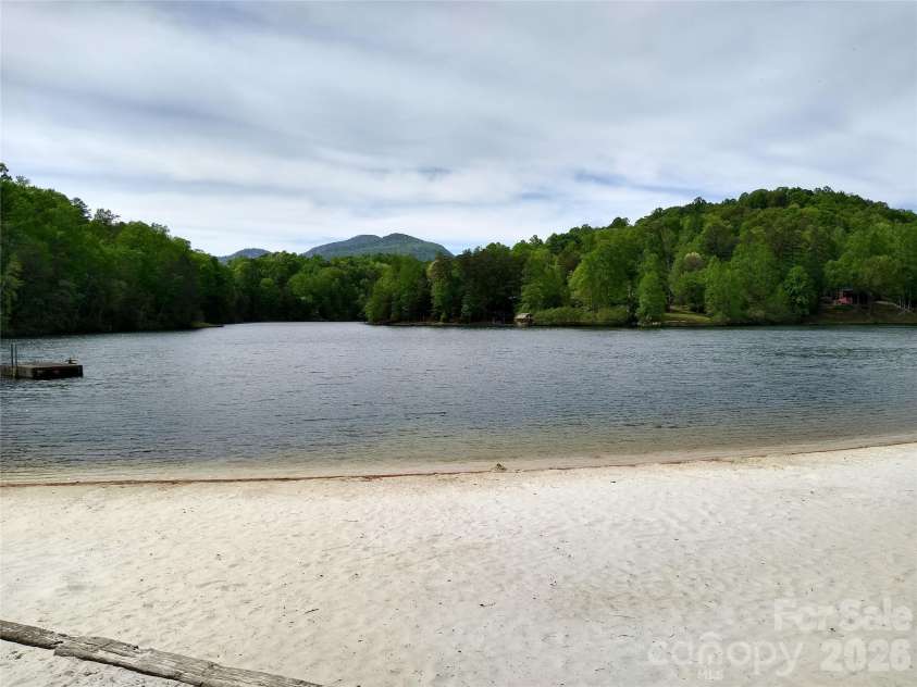 109 Overlook Point Lane, Lake Lure, NC 28746.  MLS# CAR4336925, YatesRealty ID 1029. Mirror Lake with sandy beach and picnic pavilion with grills and bathrooms. Swimming, fishing and motorized boating are allowed. Private lake, owners and guests only.