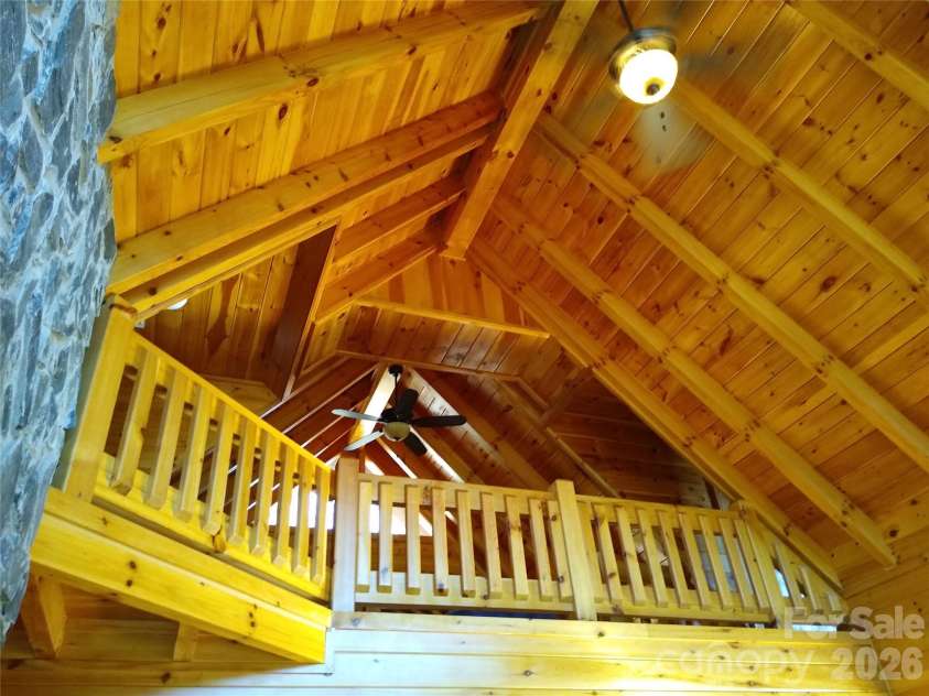 109 Overlook Point Lane, Lake Lure, NC 28746.  MLS# CAR4336925, YatesRealty ID 1029. Open loft facing the views. Vaulted and beamed ceilings