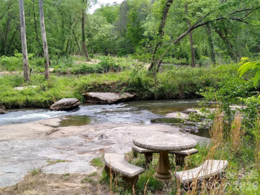 109 Overlook Point Lane, Lake Lure, NC 28746.  MLS# CAR4336925, YatesRealty ID 1029. Picnic area on Broad River
