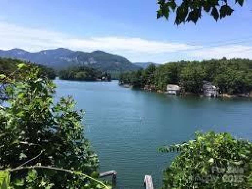 134 McDaniel Court, Lake Lure, NC 28746.  MLS# CAR4218325, YatesRealty ID 1029. Enjoy All The Amenities of Rumbling Bald