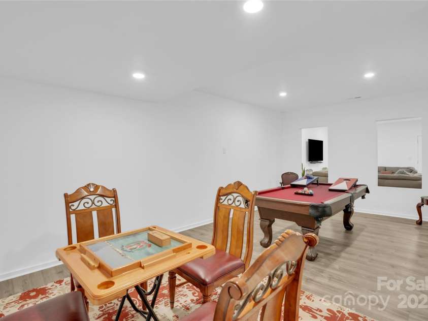 9786 Verdun Court, Fort Mill, SC 29707.  MLS# CAR4280769, YatesRealty ID 10292. Basement Game area