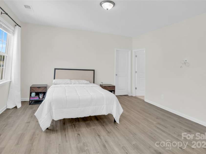 9786 Verdun Court, Fort Mill, SC 29707.  MLS# CAR4280769, YatesRealty ID 10292. Bedroom with en-suite