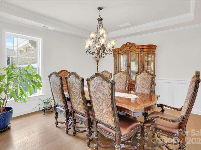 9786 Verdun Court, Fort Mill, SC 29707.  MLS# CAR4280769, YatesRealty ID 10292. Dining Room w/ Tray ceiling & wainscoting