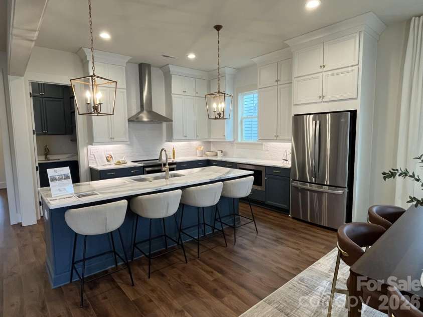 7237 Westrow Avenue, Charlotte, NC 28278.  MLS# CAR4311743, YatesRealty ID 1030. Gracious kitchen invites entertaining and shares an open space for dining and living.