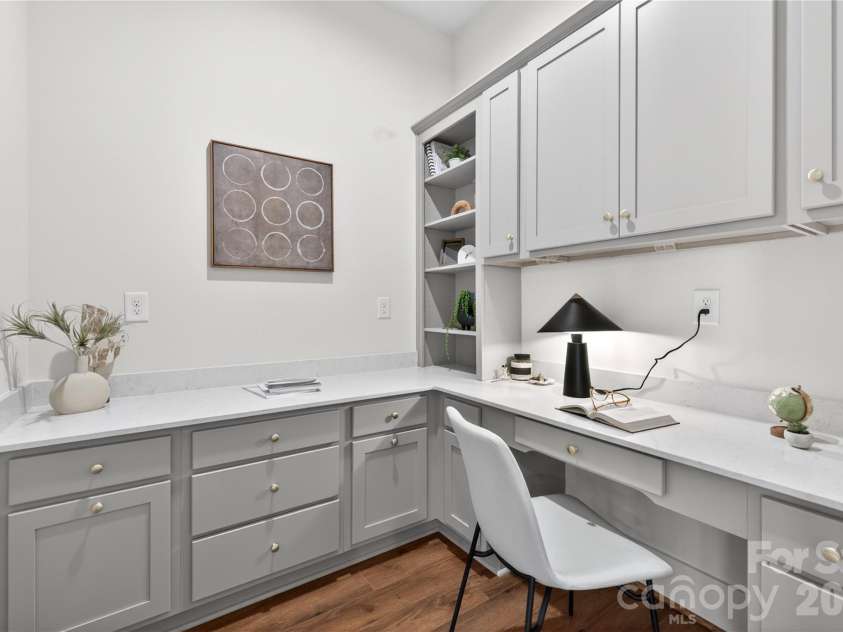 7237 Westrow Avenue, Charlotte, NC 28278.  MLS# CAR4311743, YatesRealty ID 1030. Pocket office with beautiful shelving and counter space. Perfect for home office or work space.