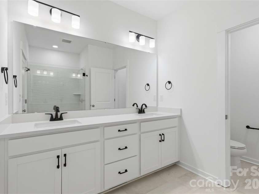 7029 Westrow Avenue, Charlotte, NC 28278.  MLS# CAR4302552, YatesRealty ID 10302. Primary Bathroom