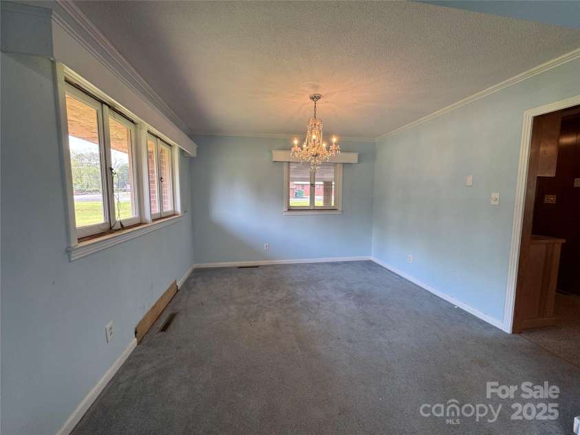 1012 Burrage Road, Concord, NC 28025.  MLS# CAR4247416, YatesRealty ID 10307. Dining room