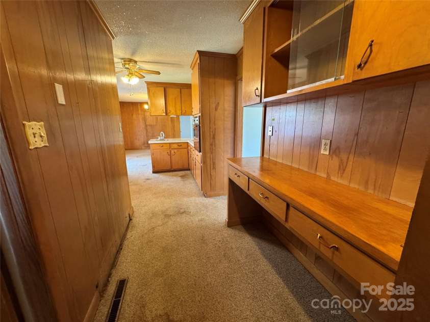 1012 Burrage Road, Concord, NC 28025.  MLS# CAR4247416, YatesRealty ID 10307. Entry hall from the carport