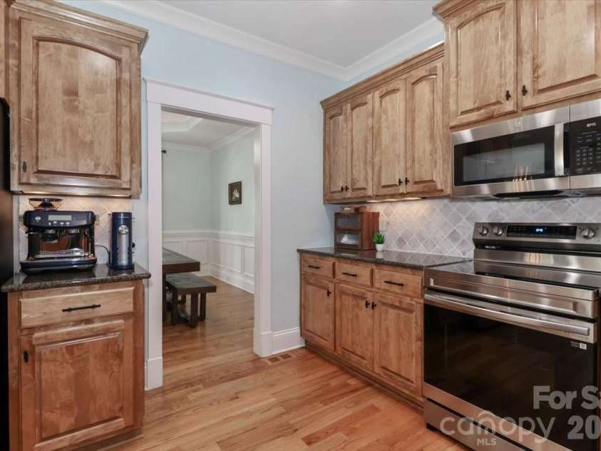 3368 Keady Mill Loop, Kannapolis, NC 28081.  MLS# CAR4357702, YatesRealty ID 10307. Kitchen looking into the dining room