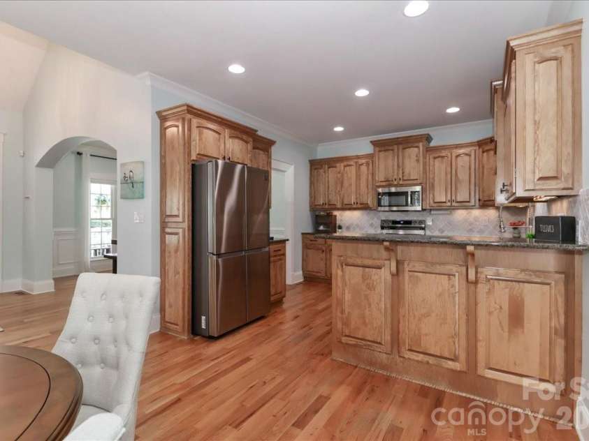 3368 Keady Mill Loop, Kannapolis, NC 28081.  MLS# CAR4357702, YatesRealty ID 10307. View into kitchen from the breakfast area