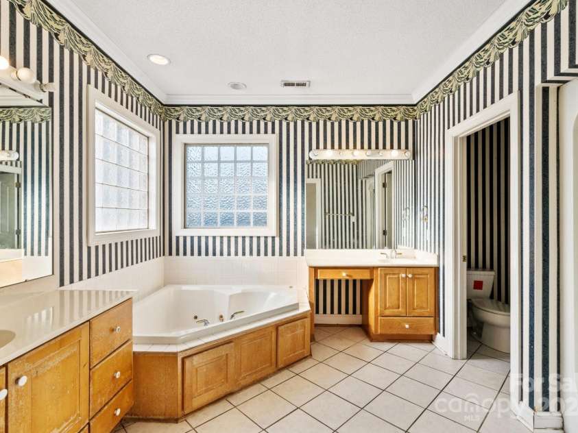 108 Cottonwood Drive, Mount Holly, NC 28120.  MLS# CAR4188958, YatesRealty ID 10314. 