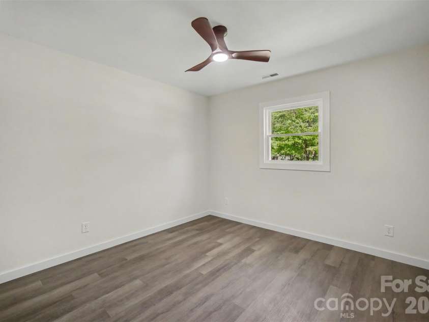 5324 Cheval Place, Charlotte, NC 28205.  MLS# CAR4421359, YatesRealty ID 10317. Lower level bedroom (4)