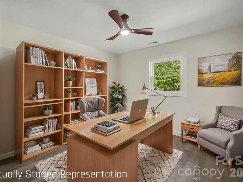 5324 Cheval Place, Charlotte, NC 28205.  MLS# CAR4421359, YatesRealty ID 10317. Lower level bedroom staged as private office