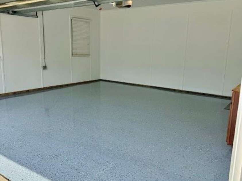 8325 Fallsdale Drive, Charlotte, NC 28214.  MLS# CAR4363701, YatesRealty ID 10318. New Epoxy and Paint on attached garage 