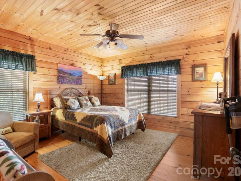 78 Longview Ridge Road, Lake Toxaway, NC 28747.  MLS# CAR4356408, YatesRealty ID 10319. Primary Bedroom on main level