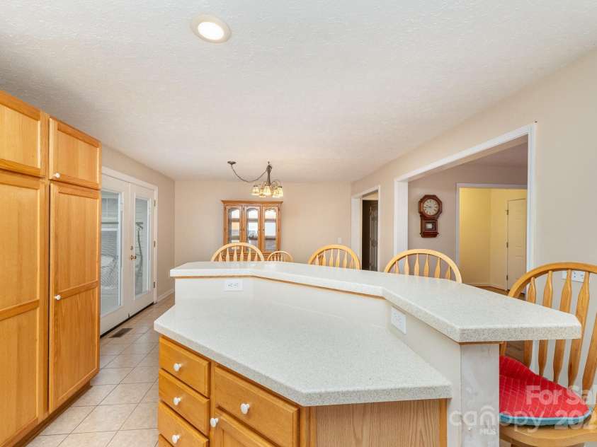 24697 Ramsey Drive, Albemarle, NC 28001.  MLS# CAR4227470, YatesRealty ID 10321. Breakfast Bar & Kitchen View with Built in Pantry