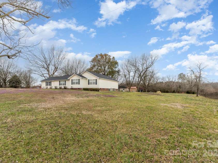 24697 Ramsey Drive, Albemarle, NC 28001.  MLS# CAR4227470, YatesRealty ID 10321. Front Yard View