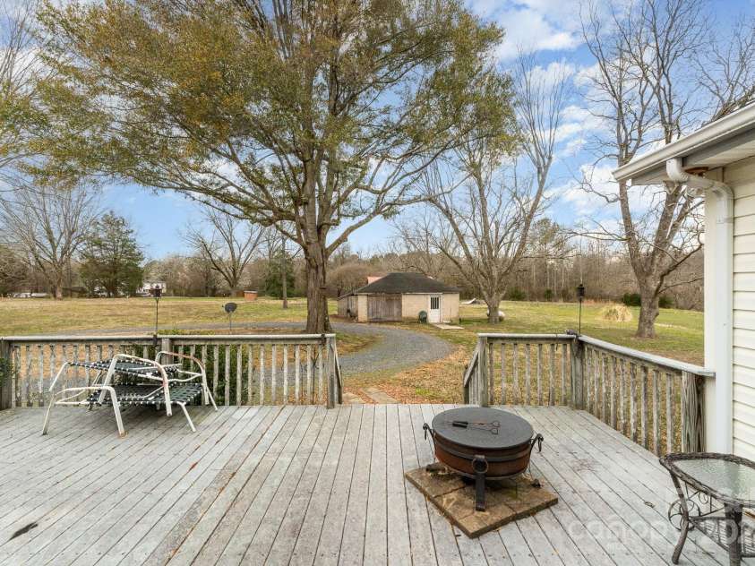 24697 Ramsey Drive, Albemarle, NC 28001.  MLS# CAR4227470, YatesRealty ID 10321. Large Back Deck