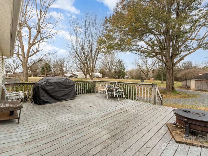 24697 Ramsey Drive, Albemarle, NC 28001.  MLS# CAR4227470, YatesRealty ID 10321. Large Back Deck