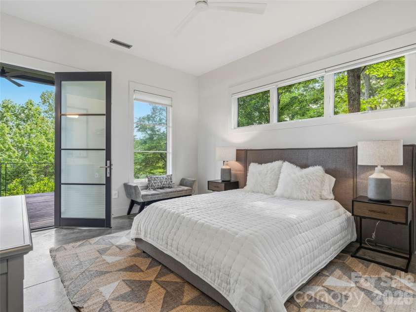 1121 Timberbluff Way, Arden, NC 28704.  MLS# CAR4389216, YatesRealty ID 10325. Guest Suite 1 with outdoors access