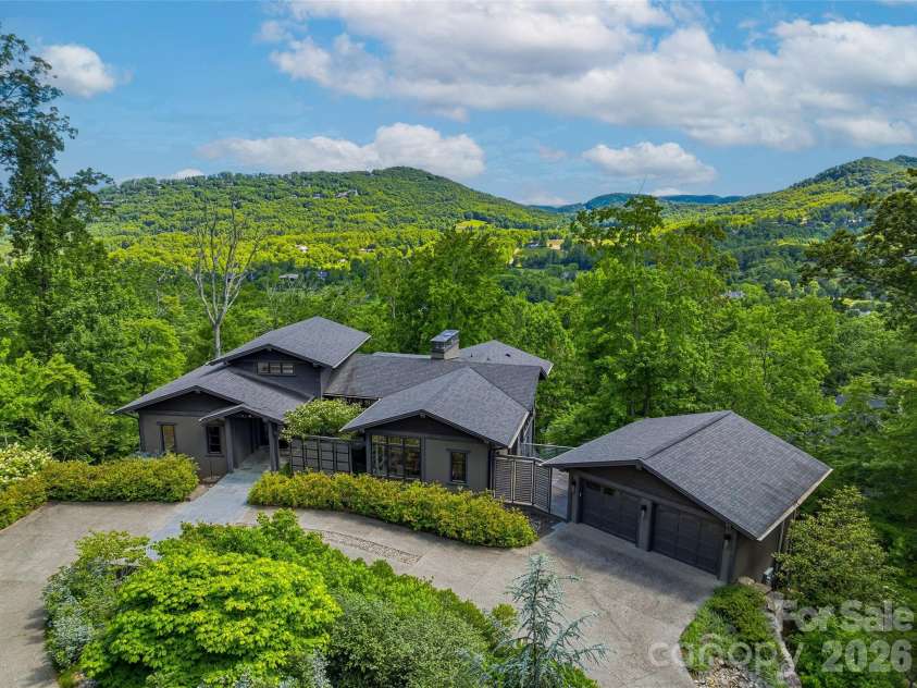 1121 Timberbluff Way, Arden, NC 28704.  MLS# CAR4389216, YatesRealty ID 10325. Long-range southern mountain views from one of Walnut Cove's most coveted vantage points