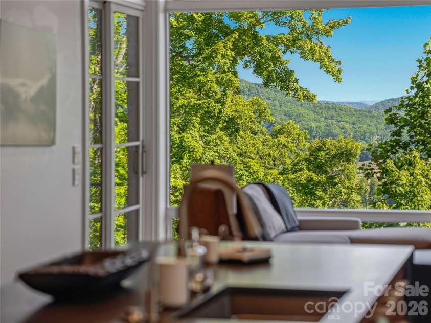 1121 Timberbluff Way, Arden, NC 28704.  MLS# CAR4389216, YatesRealty ID 10325. Mountain views enjoyed from the heart of the home