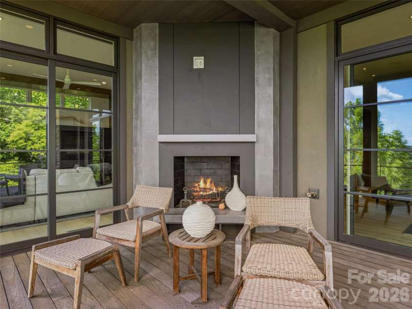 1121 Timberbluff Way, Arden, NC 28704.  MLS# CAR4389216, YatesRealty ID 10325. Outdoor living seamlessly connected to the interior gathering spaces