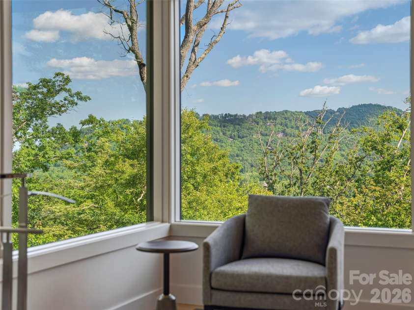 1121 Timberbluff Way, Arden, NC 28704.  MLS# CAR4389216, YatesRealty ID 10325. Wake up to panoramic Blue Ridge mountain views