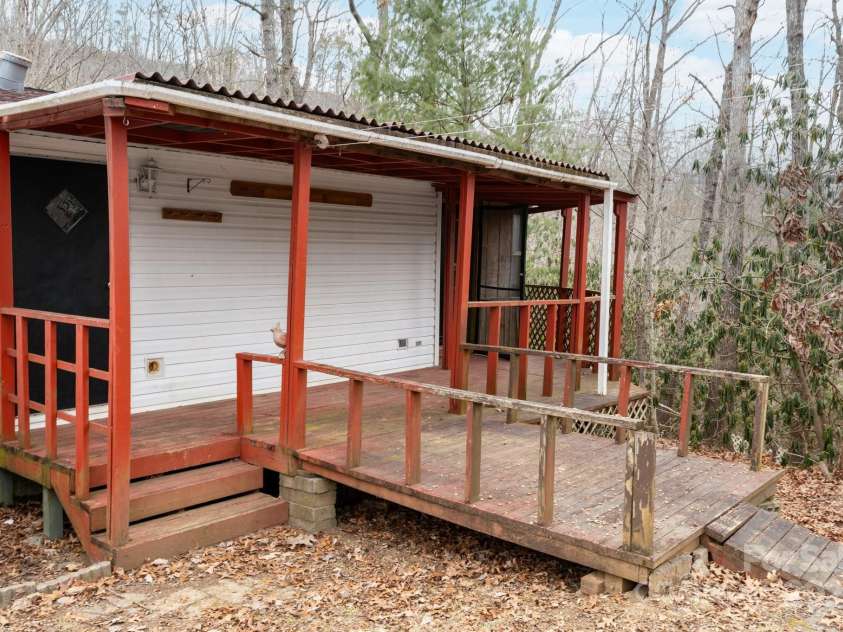 242 Breezy Mountain Lane, Mills River, NC 28759.  MLS# CAR4215866, YatesRealty ID 10330. Back porch with side porch entry.