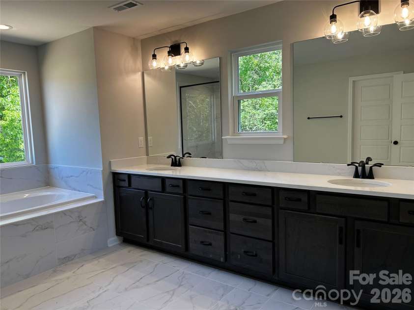 1701 Tabby Drive, Indian Trail, NC 28079.  MLS# CAR4285190, YatesRealty ID 10332. Premier Bath