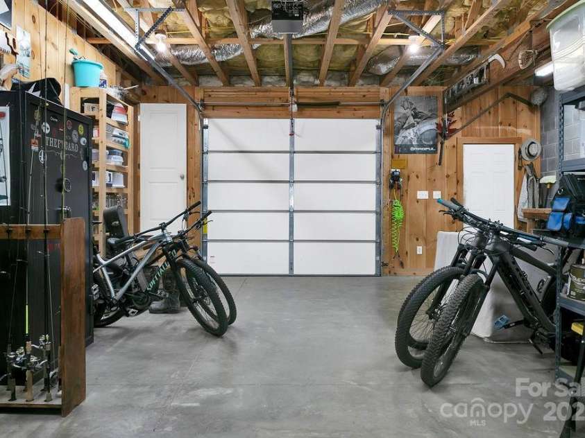 68 Sherwood Village Court, Brevard, NC 28712.  MLS# CAR4232497, YatesRealty ID 1034. 1 Car Garage in Basement