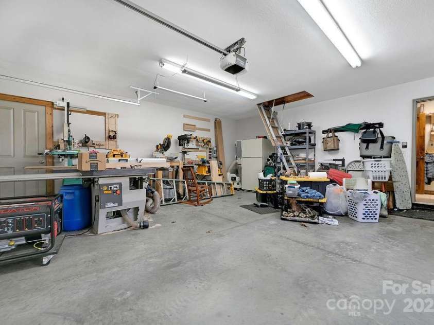 68 Sherwood Village Court, Brevard, NC 28712.  MLS# CAR4232497, YatesRealty ID 1034. 2 Car Garage on the Main Level